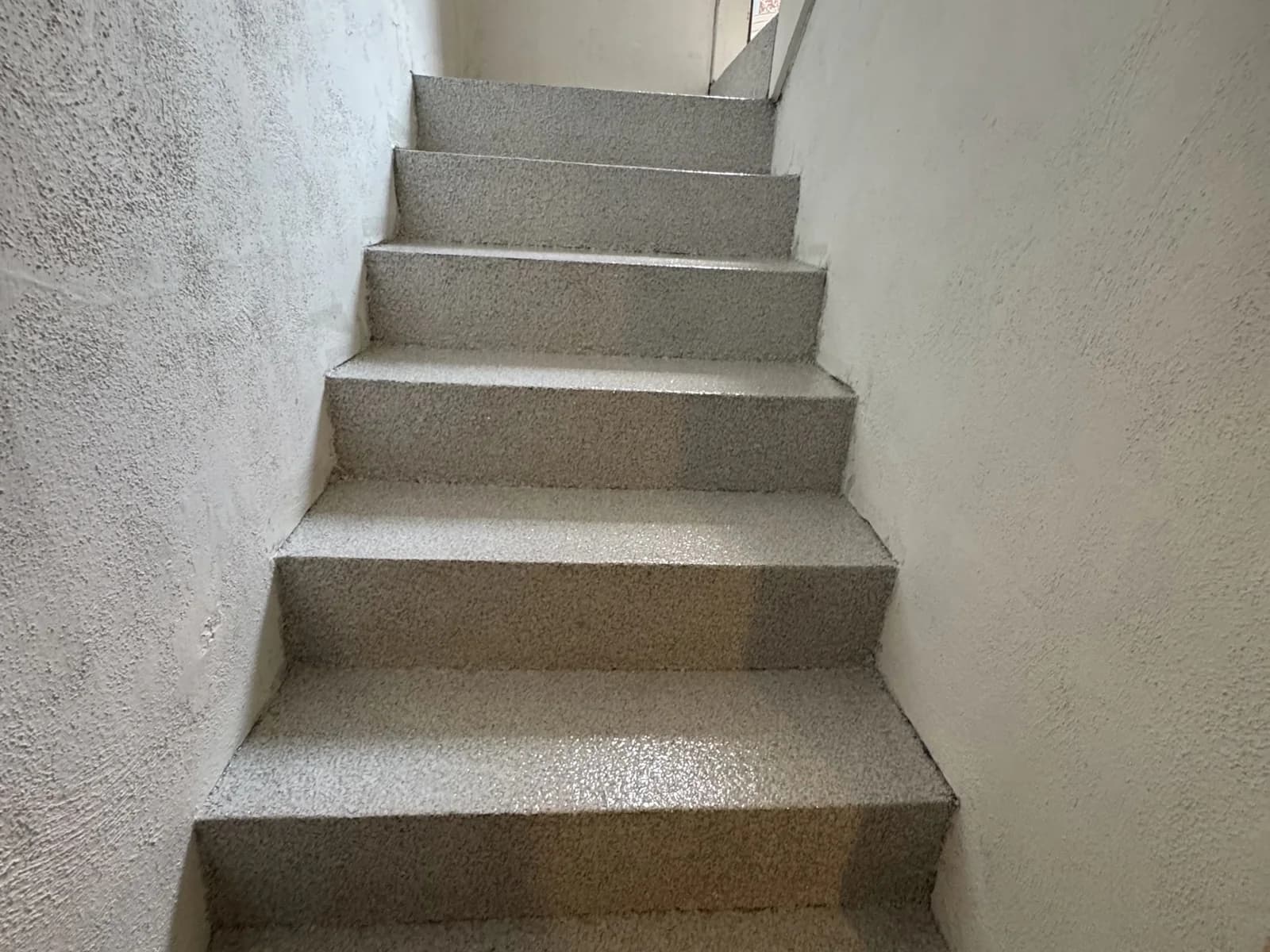 Epoxy flake coated concrete staircase