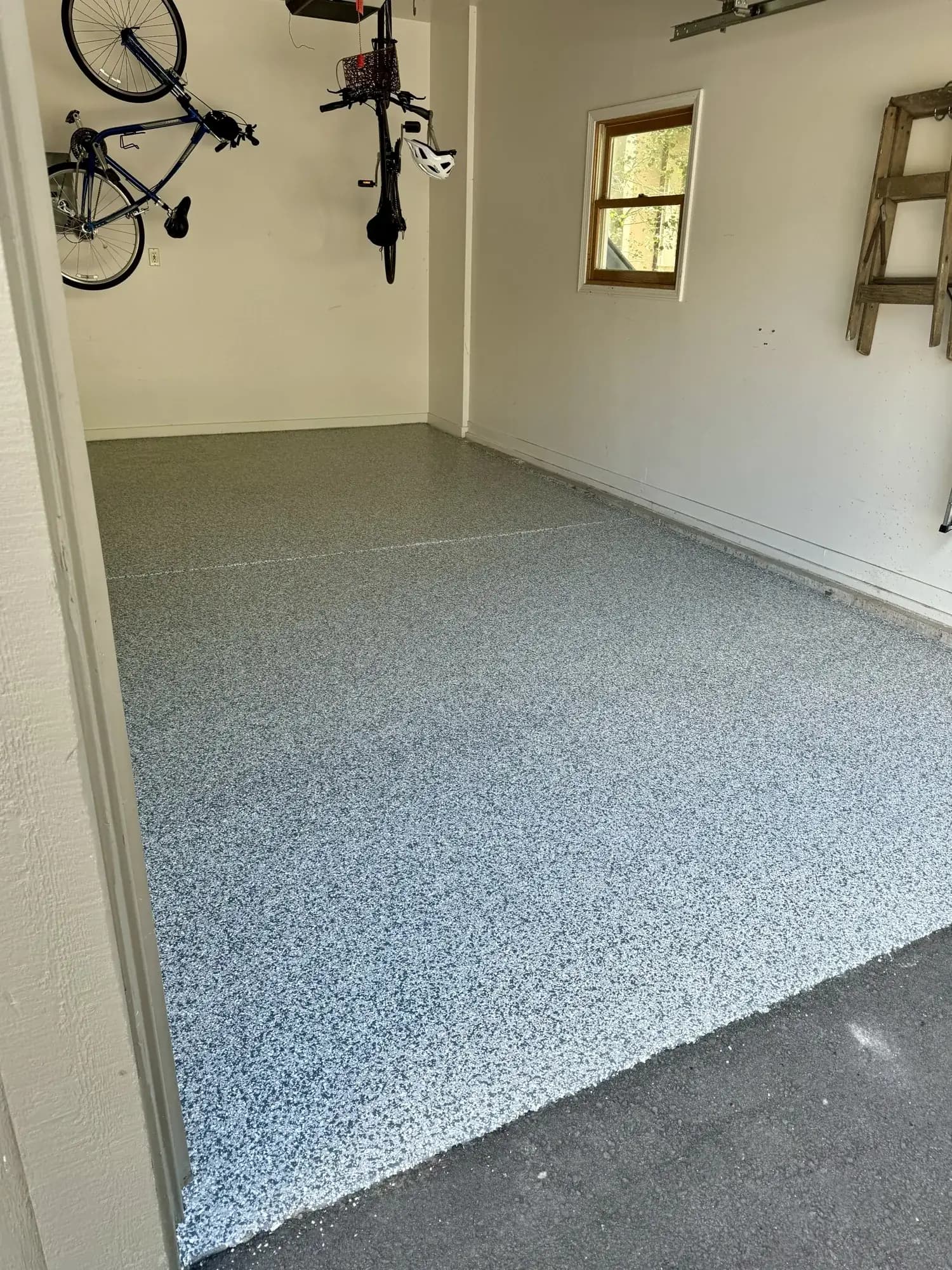 Epoxy flake garage floor coating in natural daylight