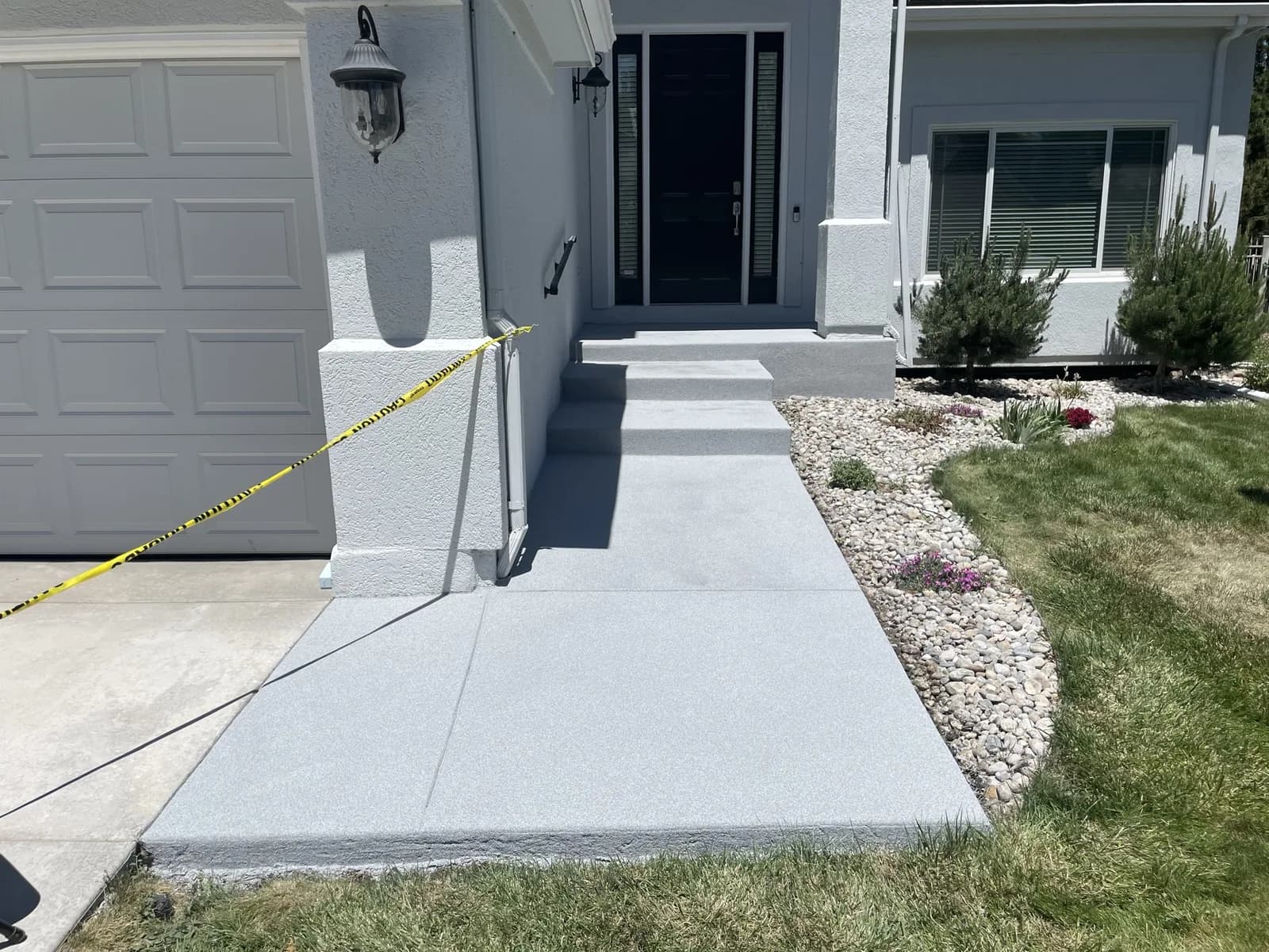 Quartz-coated front entry walkway and steps