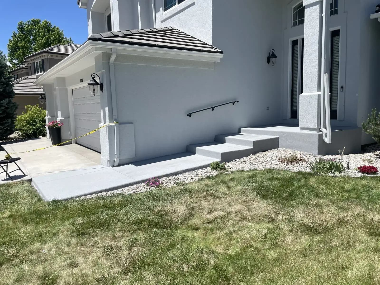 Quartz walkway and front porch steps after coating