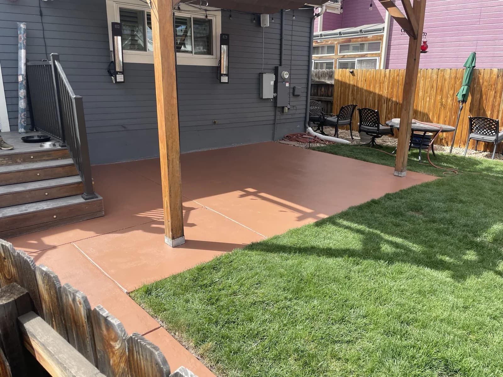 Terracotta concrete patio coating in a Colorado backyard
